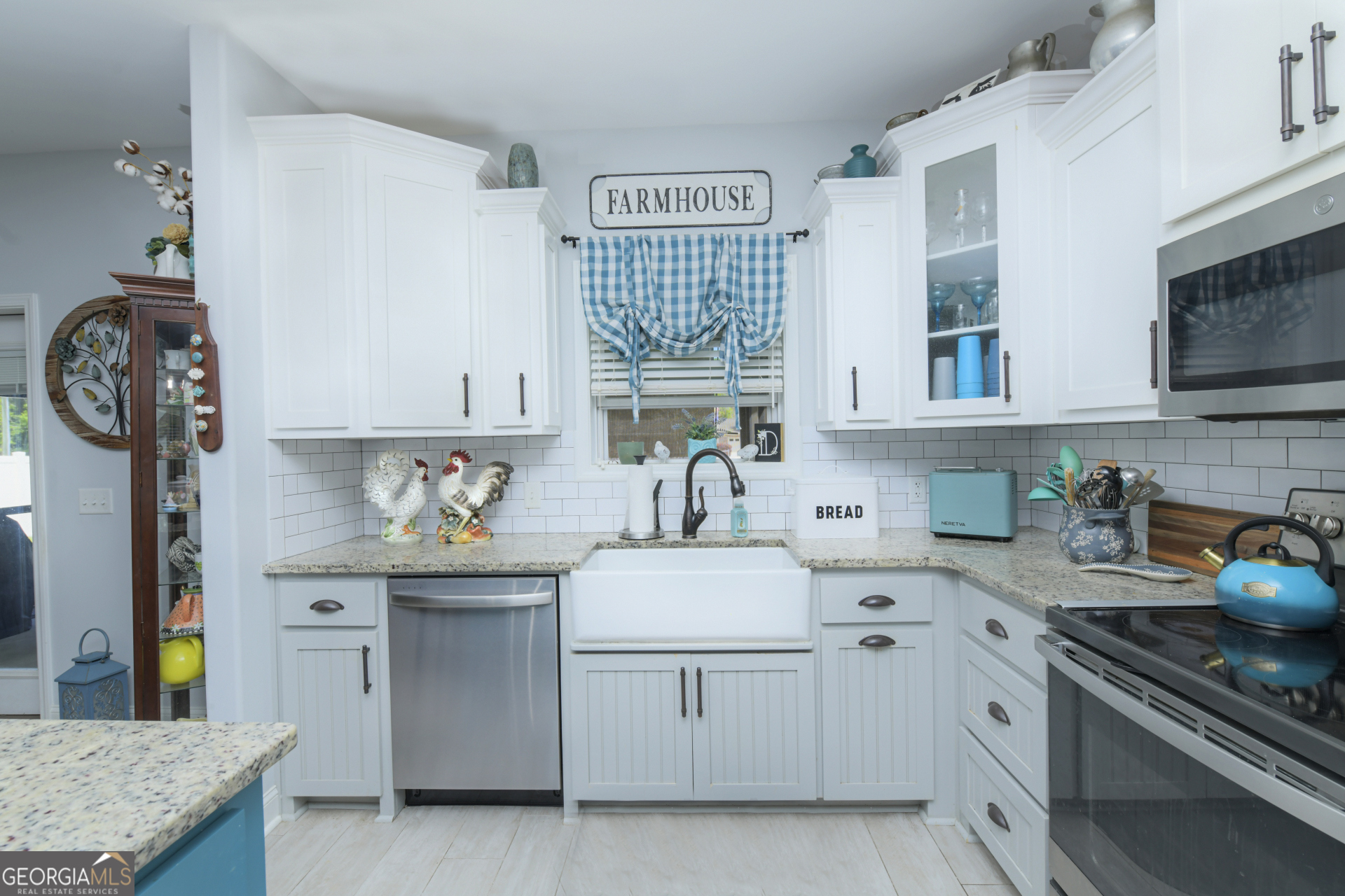 107 Elmo H Circle St. Marys, GA 31558 - Photo 7 of 31 a kitchen with stainless steel appliances a sink stove and cabinets
