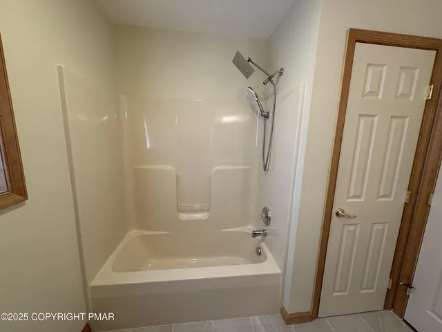 a bathroom with a bathtub
