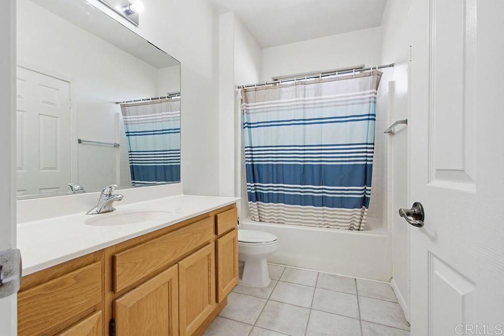 4002 Craven Road, Unit 4 Oceanside, CA 92057 - Photo 23 of 37 a bathroom with a sink toilet and shower