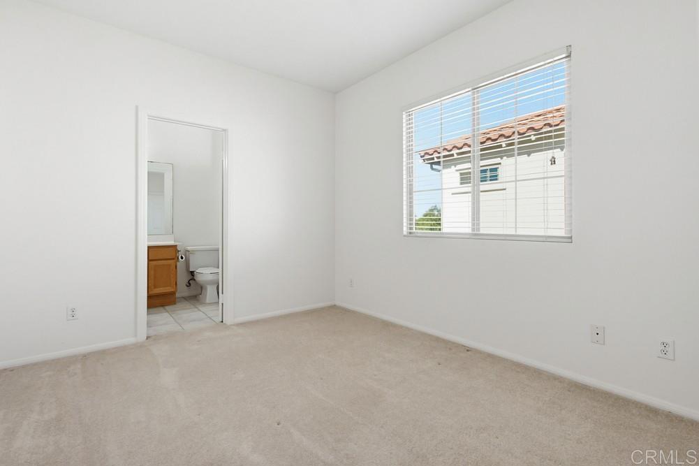 4002 Craven Road, Unit 4 Oceanside, CA 92057 - Photo 25 of 37 an empty room with a window