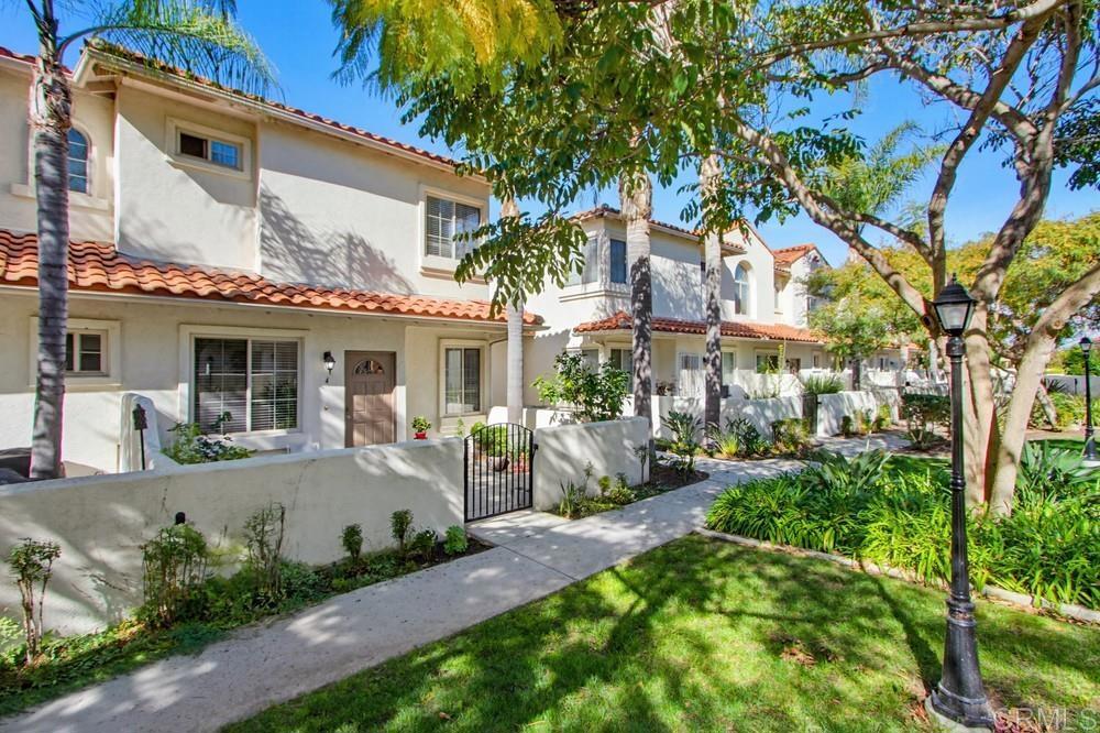 4002 Craven Road, Unit 4 Oceanside, CA 92057 - Photo 3 of 37 a front view of a house with garden and porch