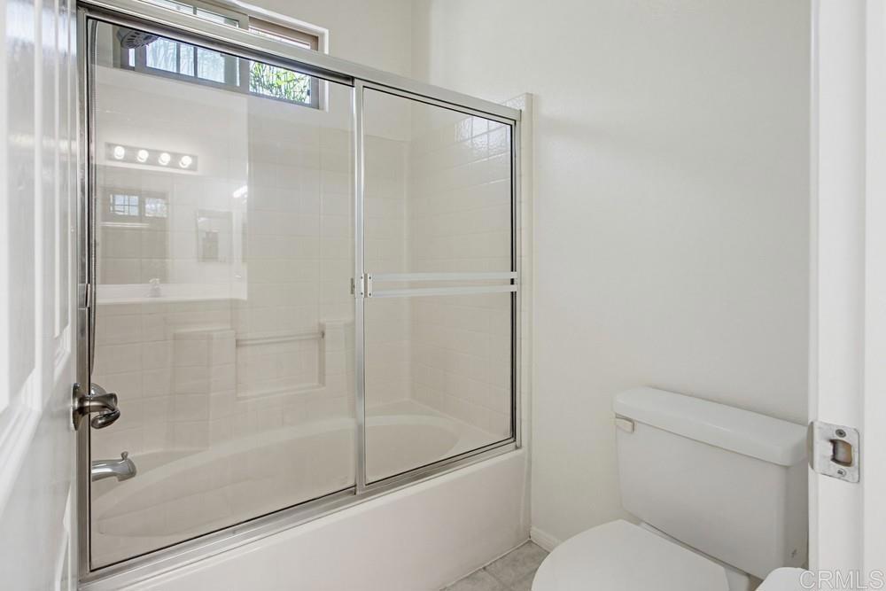 4002 Craven Road, Unit 4 Oceanside, CA 92057 - Photo 32 of 37 a bathroom with a shower and a toilet