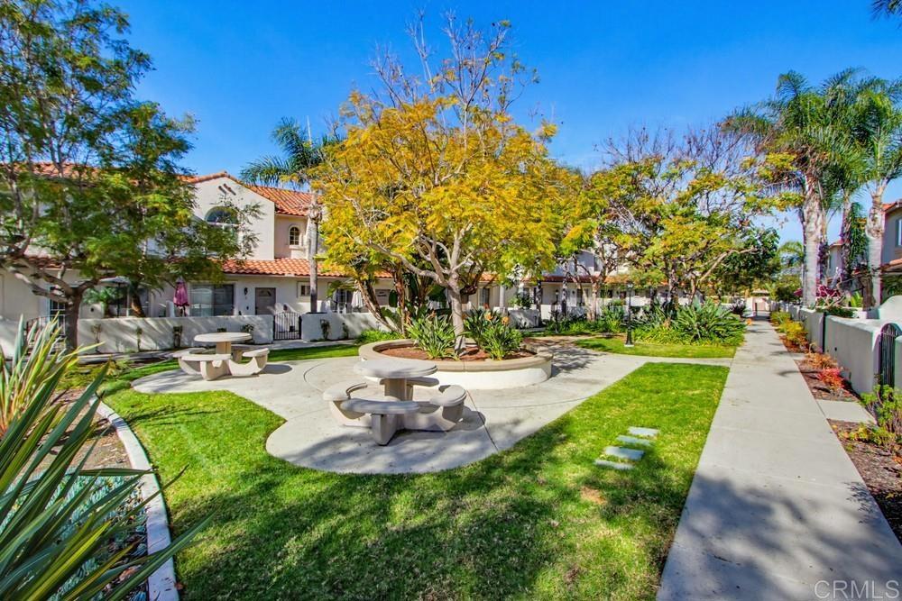 4002 Craven Road, Unit 4 Oceanside, CA 92057 - Photo 36 of 37 a swimming pool with outdoor seating and yard