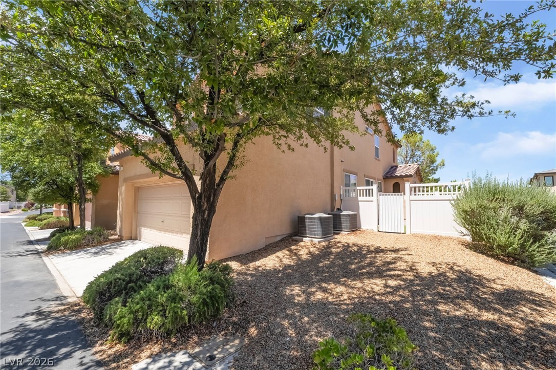 3175 Via Seranova Henderson, NV 89044 - Photo 7 of 45 This charming home offers a garage and well-maintained outdoor spaces for effortless living.