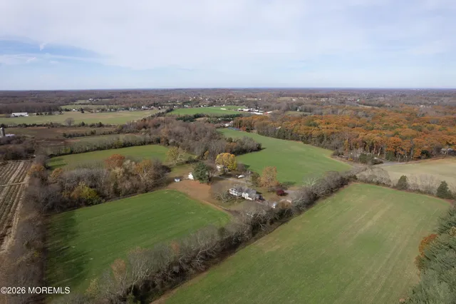 a bathroom with a sink a toilet and a shower