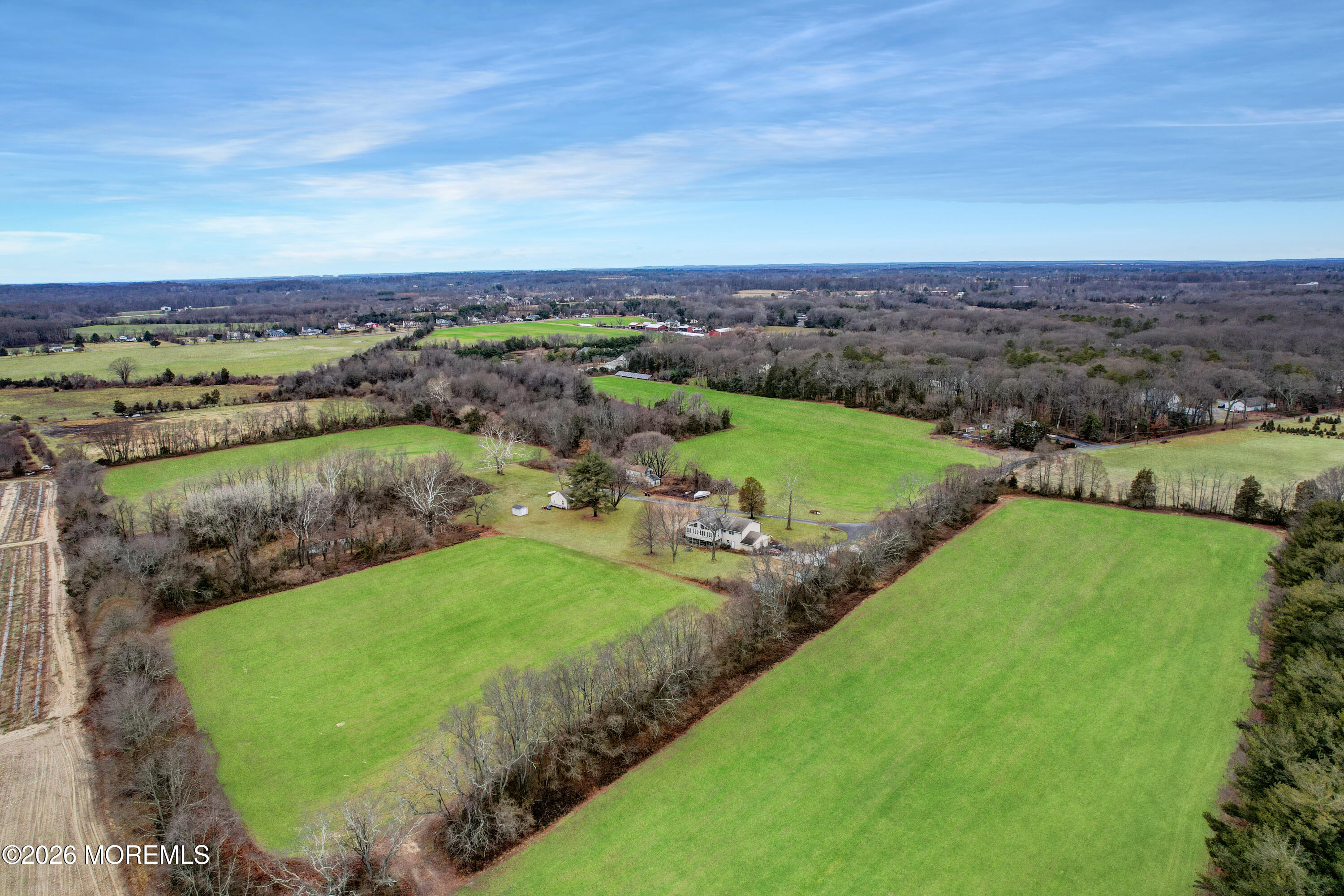 170-174 West Millstream Road Cream Ridge, NJ 08514 - Photo 17 of 105 an aerial view of a golf course with huge green field
