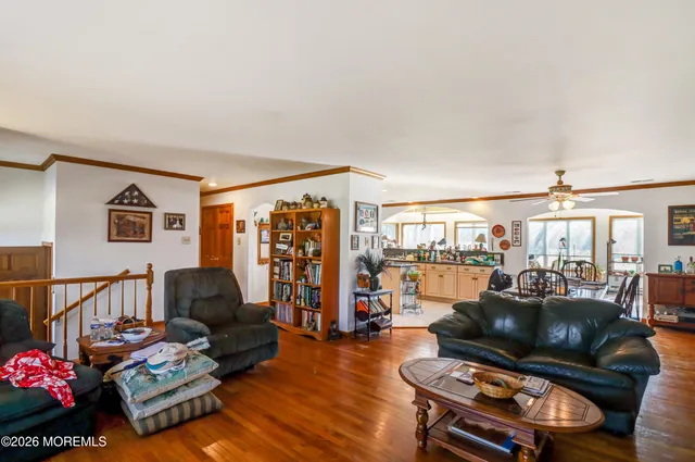 a bathroom with a tub sink and shower