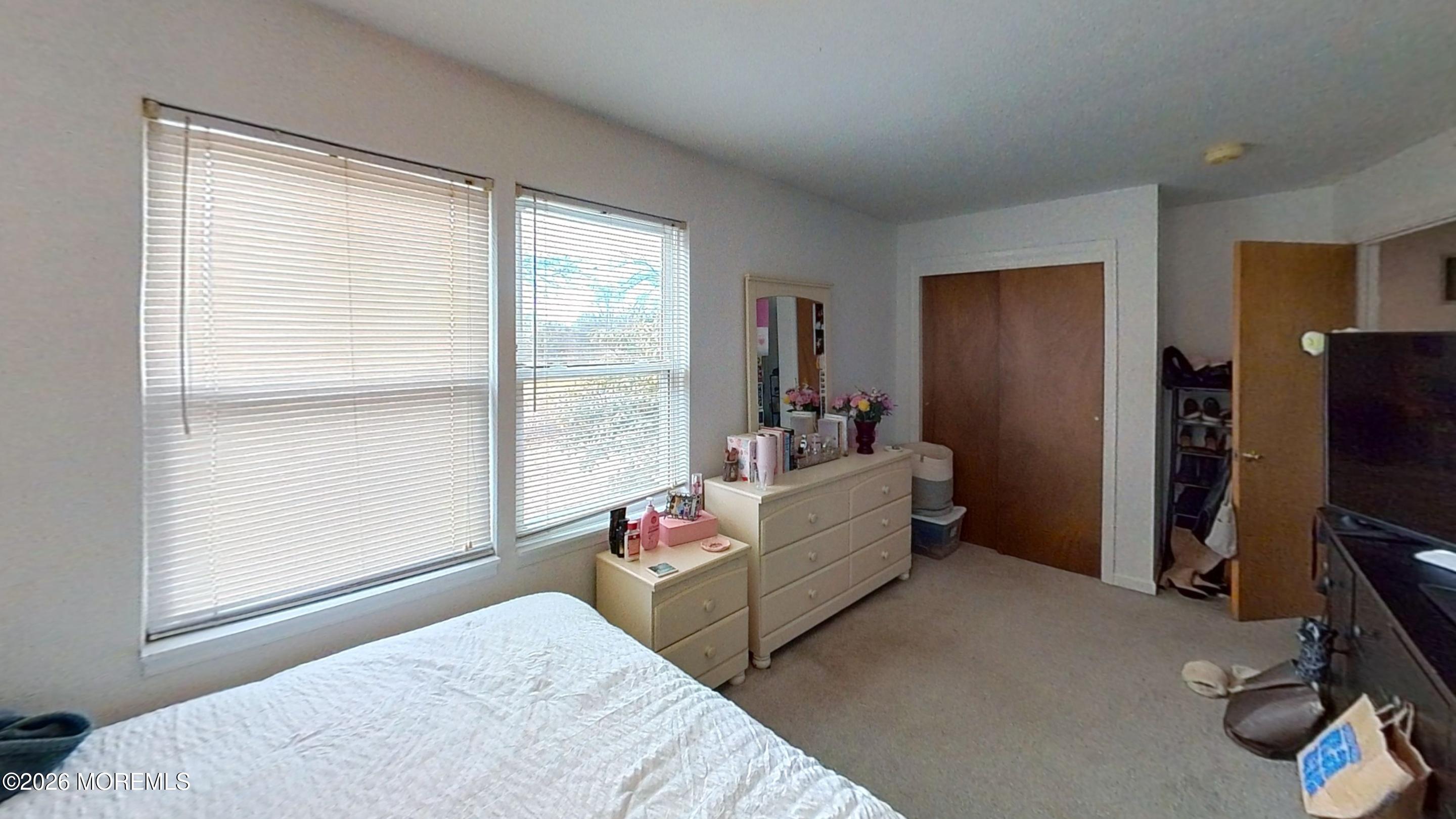 170-174 West Millstream Road Cream Ridge, NJ 08514 - Photo 41 of 105 a bedroom with a bed and a window