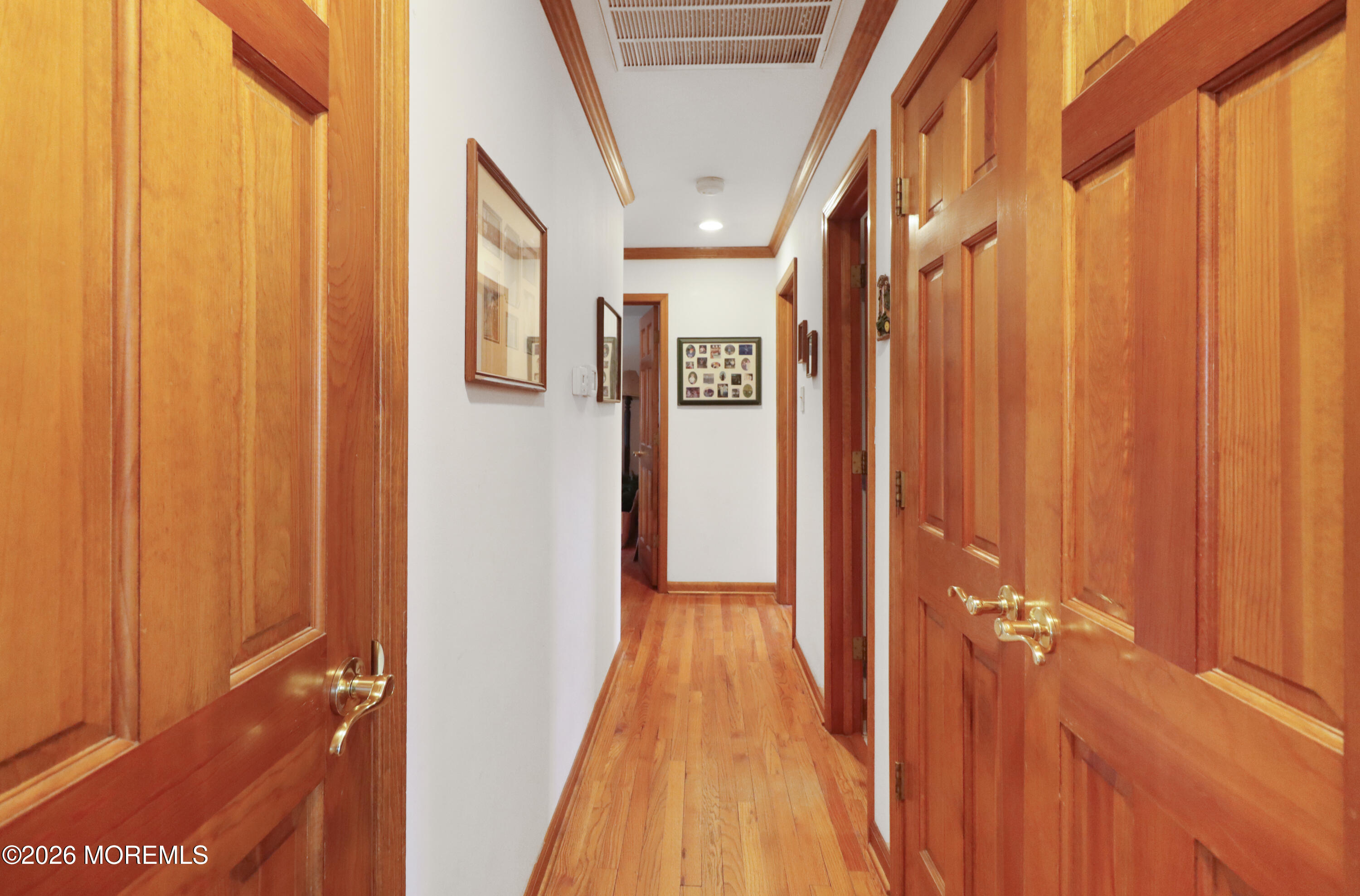 170-174 West Millstream Road Cream Ridge, NJ 08514 - Photo 59 of 105 a view of a hallway with wooden floor and staircase