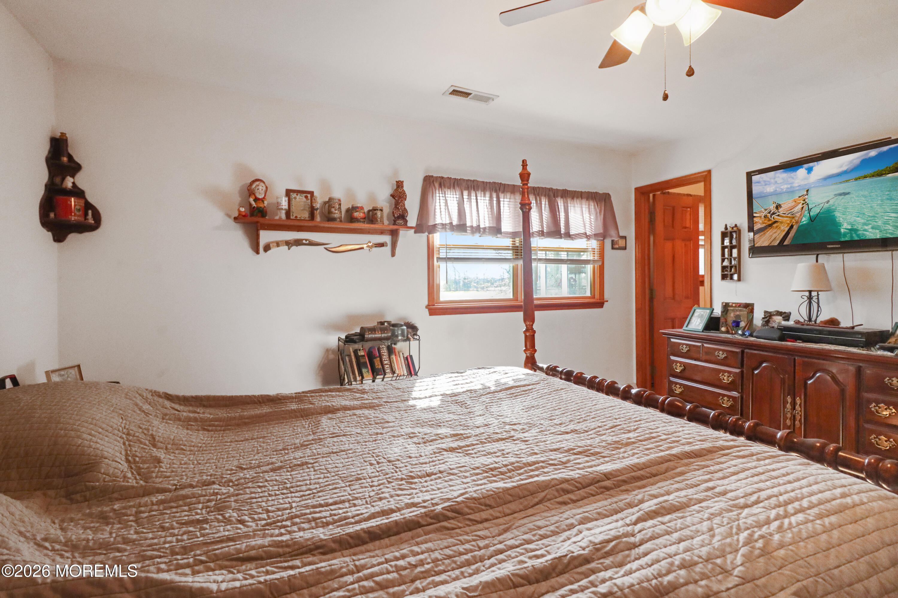 170-174 West Millstream Road Cream Ridge, NJ 08514 - Photo 62 of 105 a bedroom with a bed and a large window