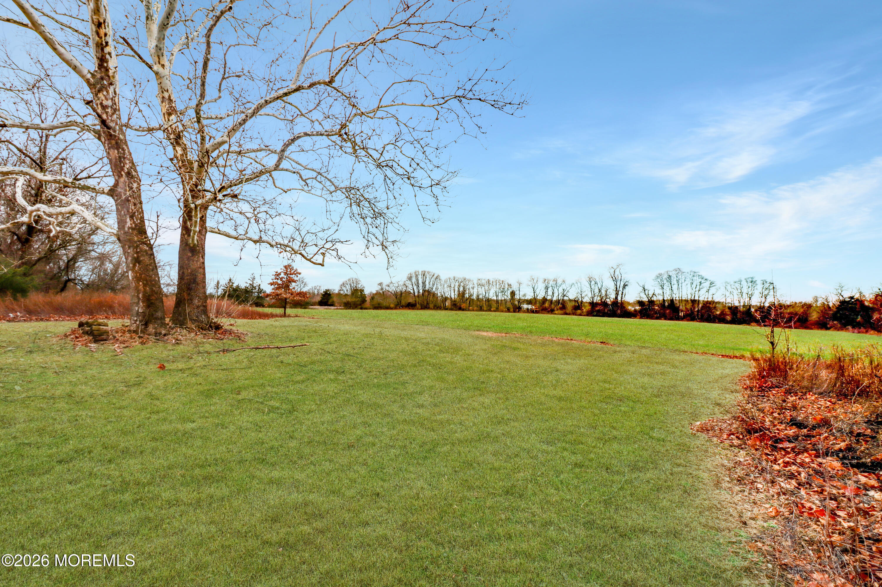 170-174 West Millstream Road Cream Ridge, NJ 08514 - Photo 63 of 105 a view of a lake with houses in the back