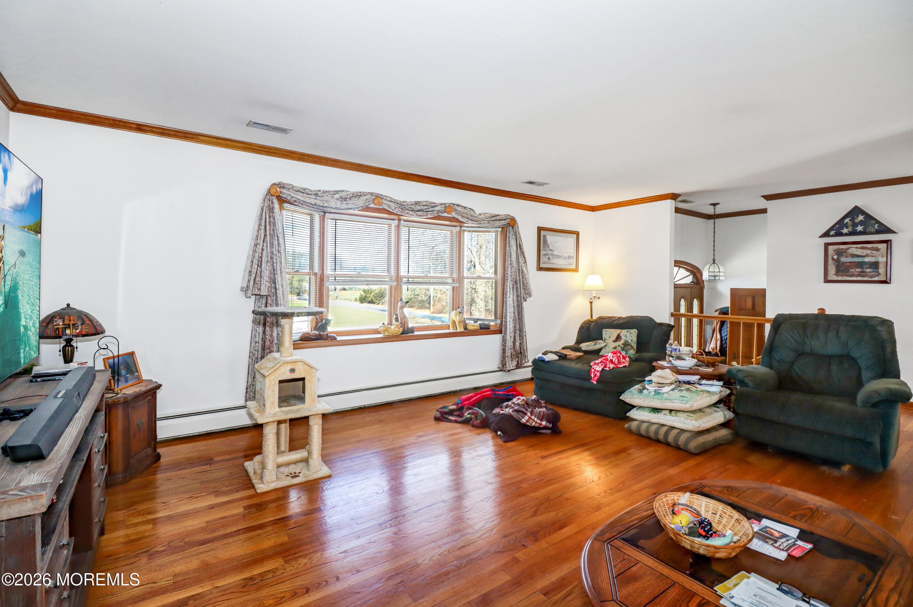170-174 West Millstream Road Cream Ridge, NJ 08514 - Photo 75 of 105 a living room with furniture and a wooden floor