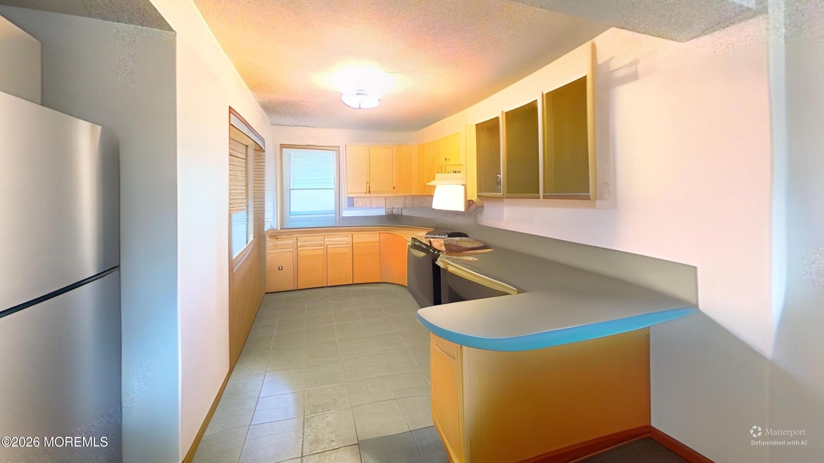 170-174 West Millstream Road Cream Ridge, NJ 08514 - Photo 77 of 105 a kitchen with stainless steel appliances granite countertop a sink a stove and a refrigerator