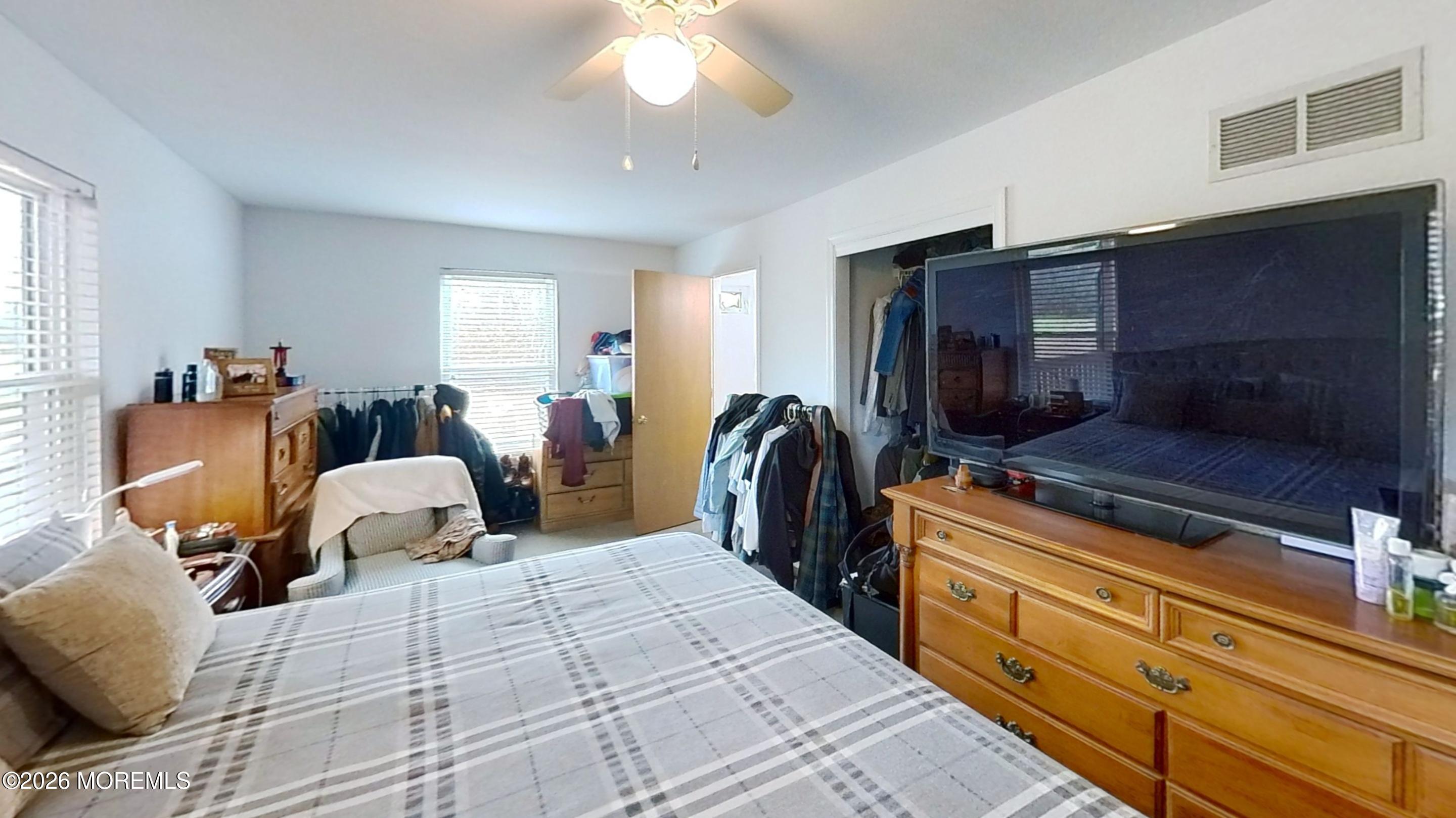 170-174 West Millstream Road Cream Ridge, NJ 08514 - Photo 90 of 105 a bed room with a bed and a television