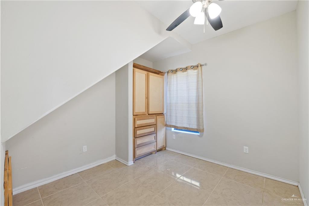 9445 Mile 20 Road Edcouch, TX 78538 - Photo 11 of 24 an empty room with closet and windows