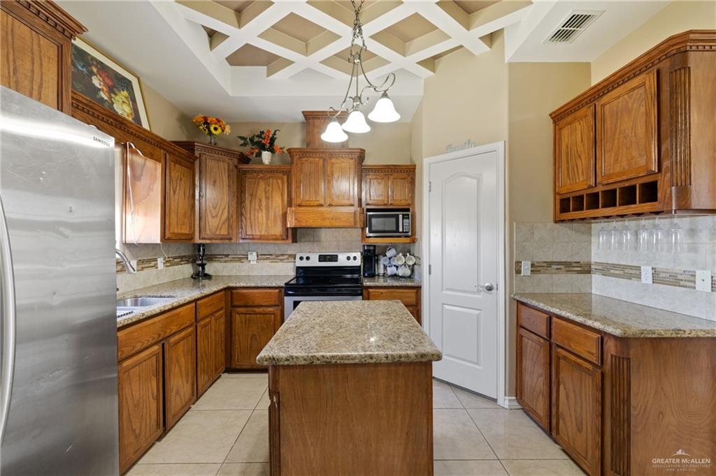 9445 Mile 20 Road Edcouch, TX 78538 - Photo 5 of 24 a kitchen with a sink stove and cabinets