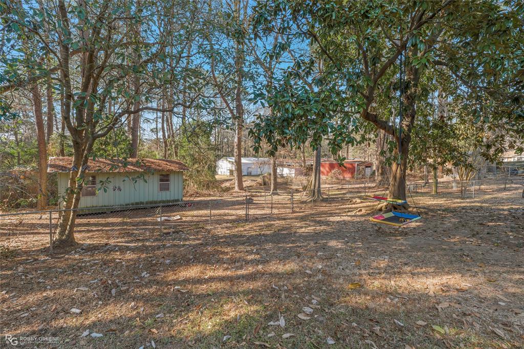 803 Drew Lane Minden, LA 71055 - Photo 26 of 33 a view of street with trees