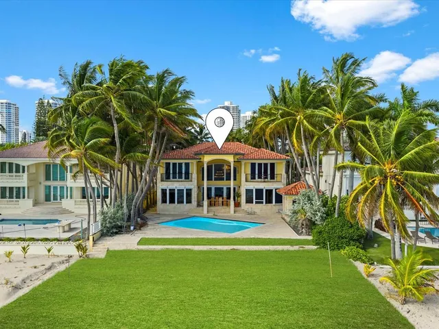 a view of backyard with swimming pool and outdoor seating