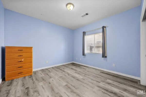 wooden floor and window in a room