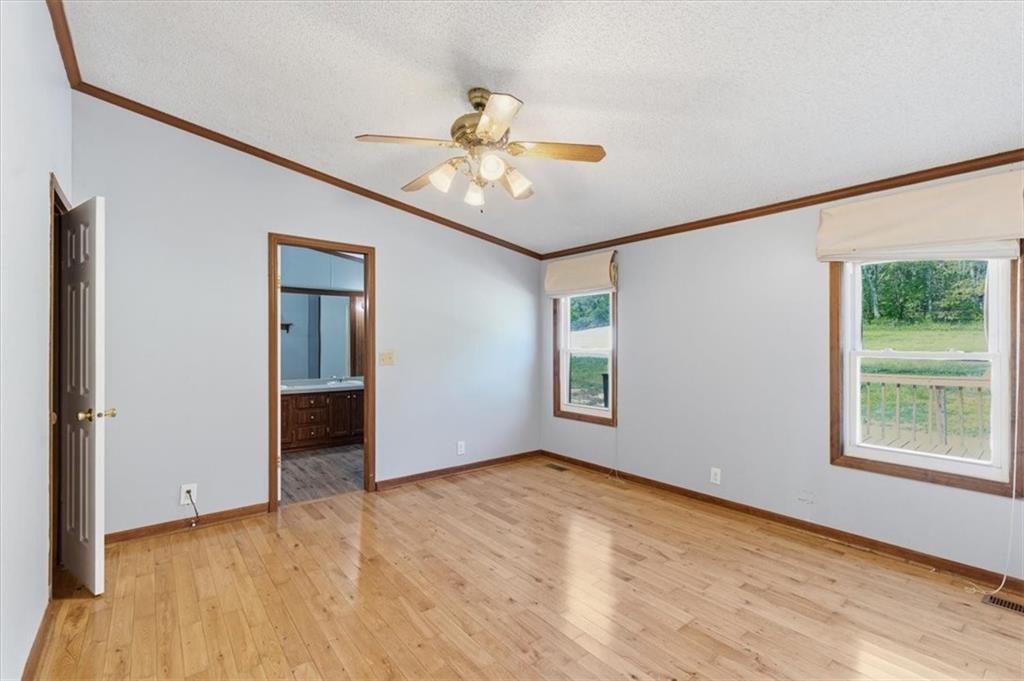 235 Kirk Road Northwest White, GA 30184 - Photo 12 of 41 a view of an empty room with a window