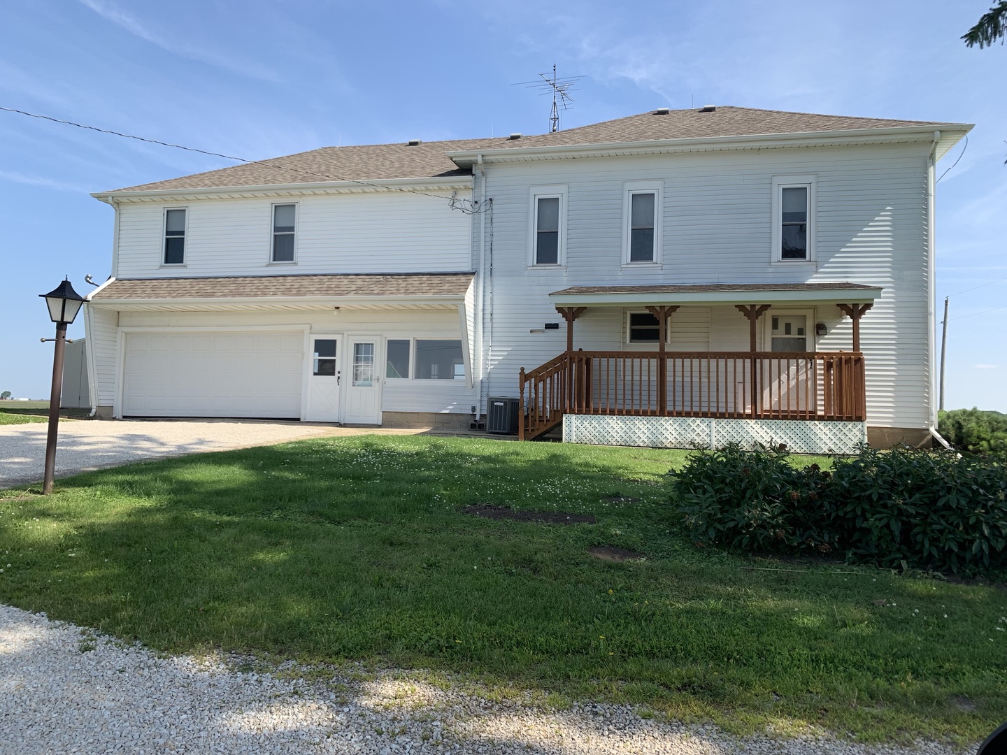 8388 South Brooklyn Road Rochelle, IL 61068 - Photo 1 of 32 a view of a house with a yard