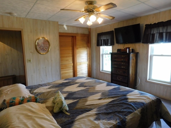 8388 South Brooklyn Road Rochelle, IL 61068 - Photo 16 of 32 a bedroom with bed and window