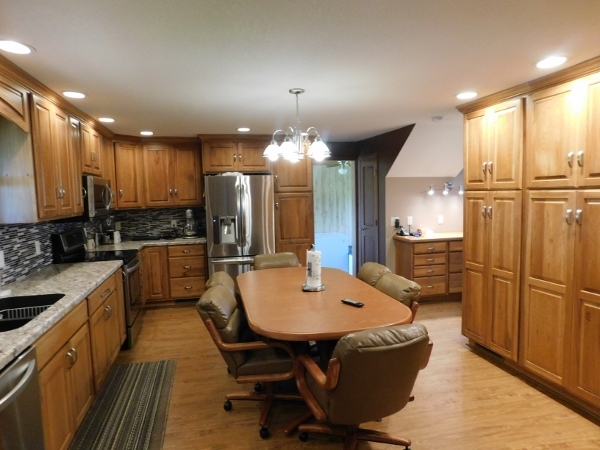 8388 South Brooklyn Road Rochelle, IL 61068 - Photo 6 of 32 a large kitchen with a table and chairs