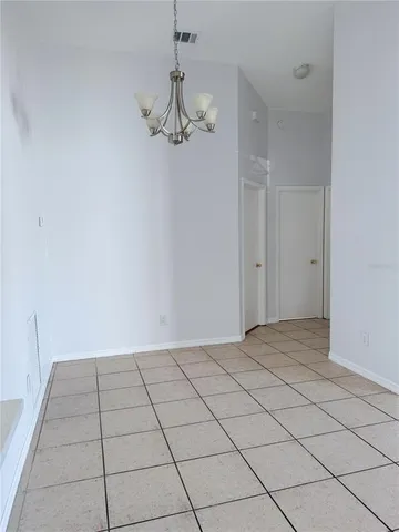 a view of a livingroom and window