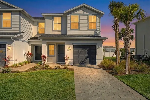 a front view of a house with patio