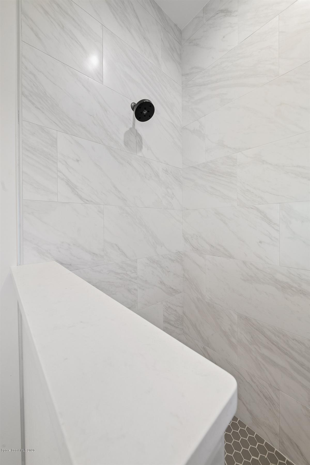 2158 Country Club Road Melbourne, FL 32901 - Photo 35 of 94 a view of a bath tub sitting in a bathroom