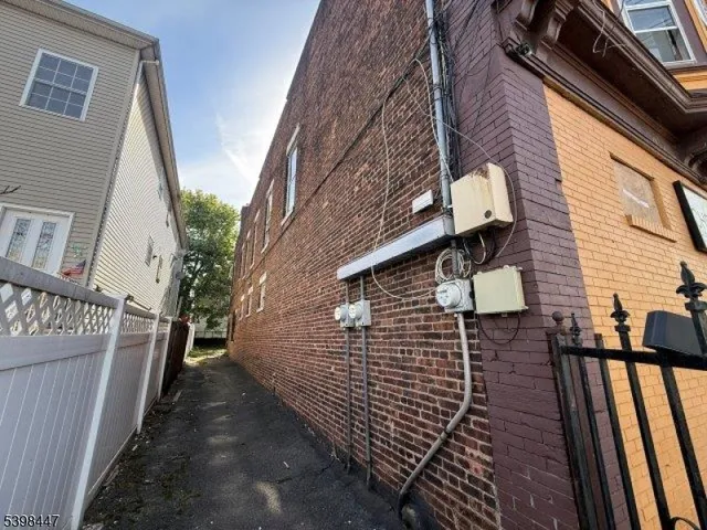 a view of a house with stairs and wooden floor
