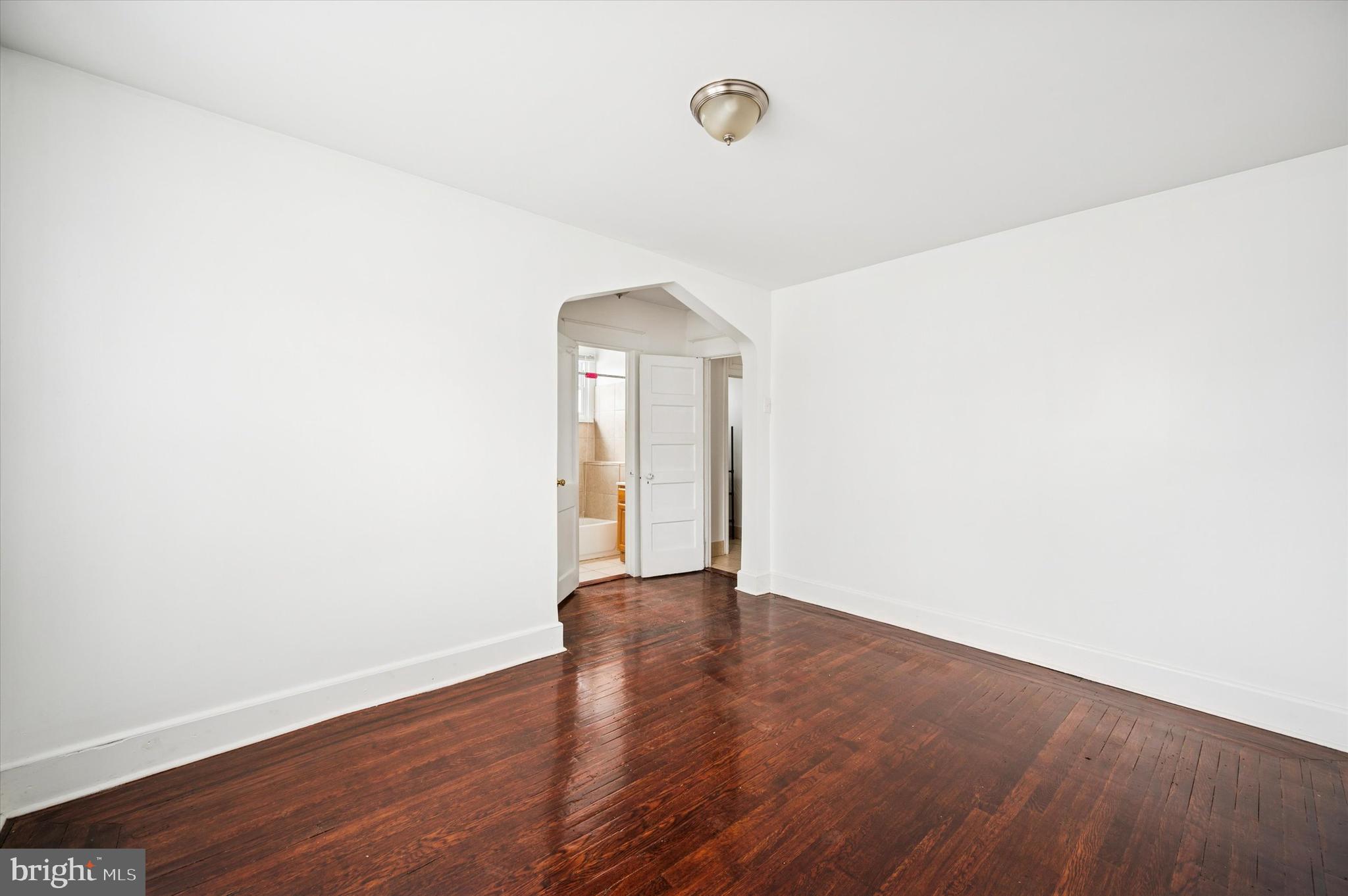 2000 Widener Place, Unit 2 Philadelphia, PA 19138 - Photo 10 of 15 a view of an empty room with wooden floor