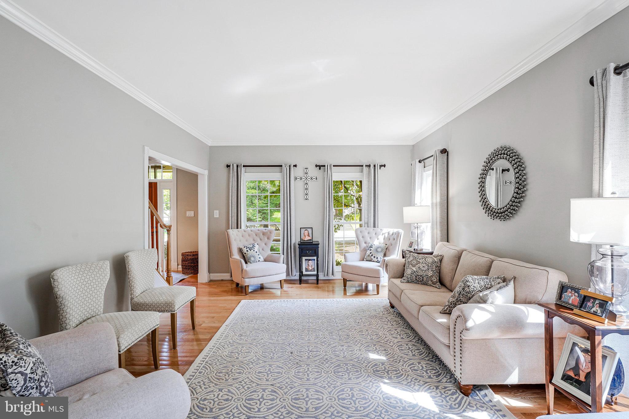 20627 Cutwater Place Sterling, VA 20165 - Photo 15 of 42 a living room with furniture and a large window