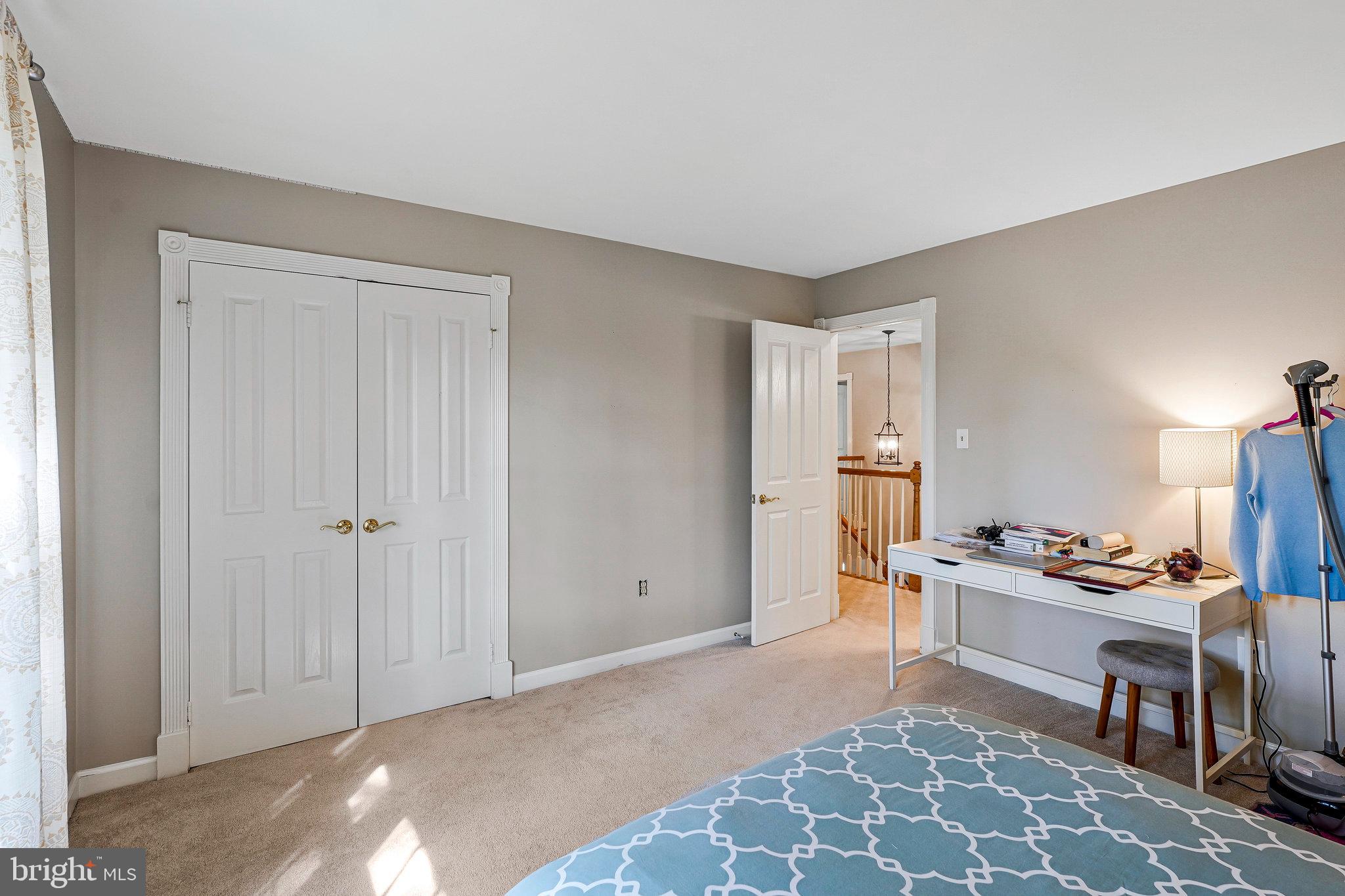 20627 Cutwater Place Sterling, VA 20165 - Photo 30 of 42 a living room with furniture a piano and a window