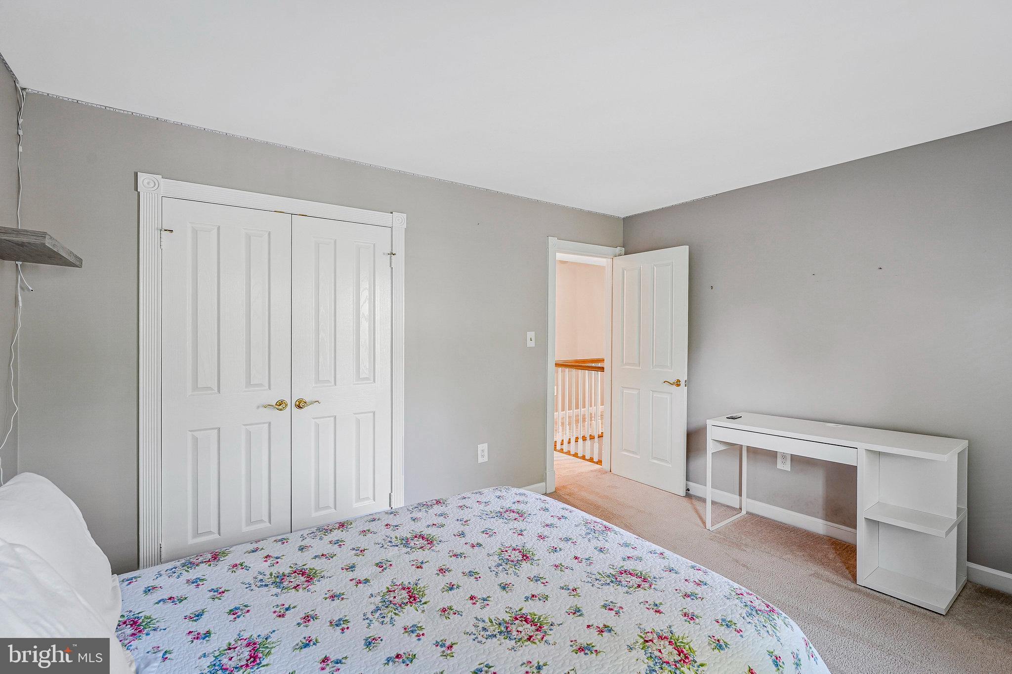 20627 Cutwater Place Sterling, VA 20165 - Photo 32 of 42 a bedroom with a bed and a window