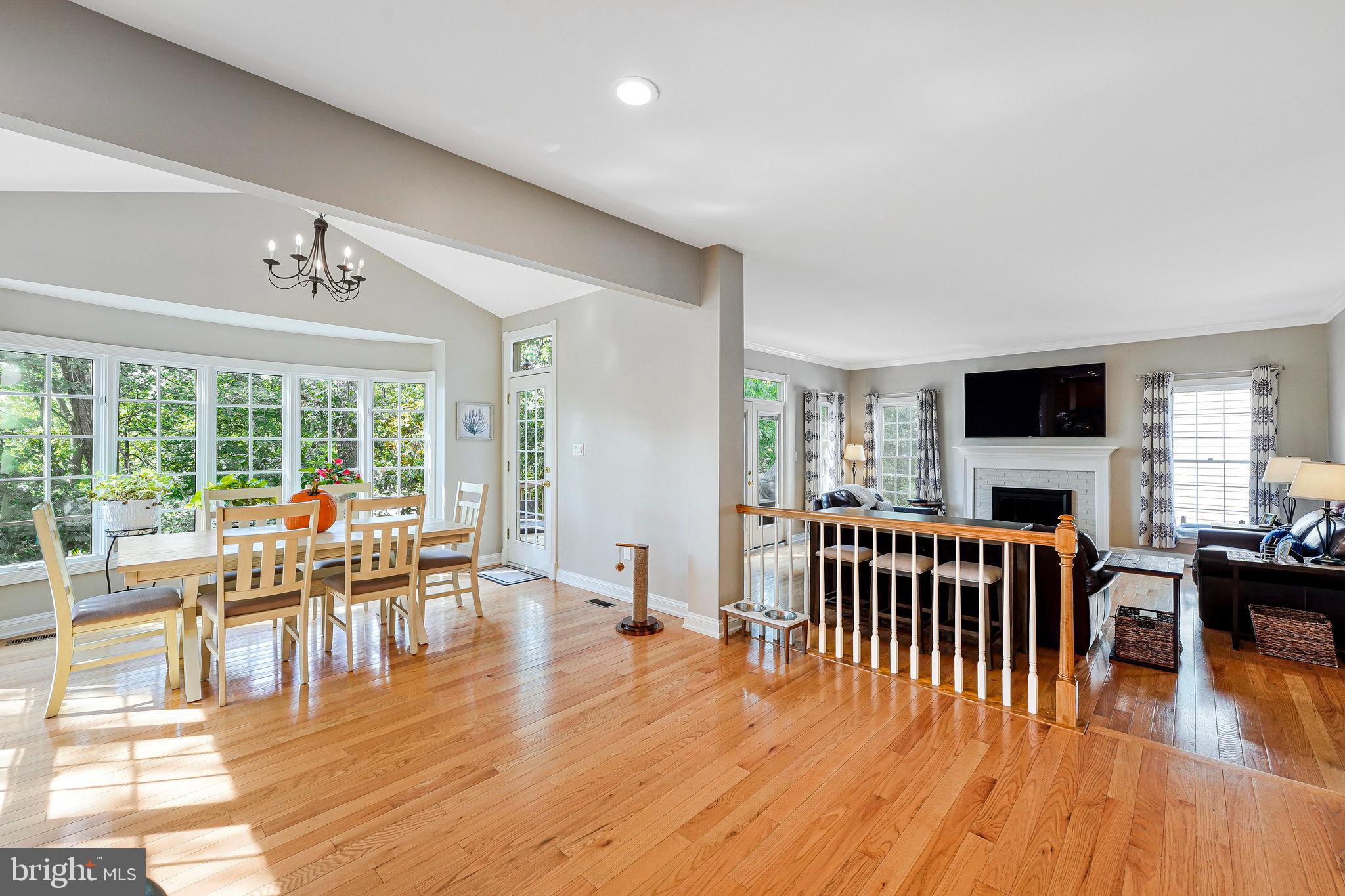 20627 Cutwater Place Sterling, VA 20165 - Photo 9 of 42 a view of a dining room with furniture and wooden floor