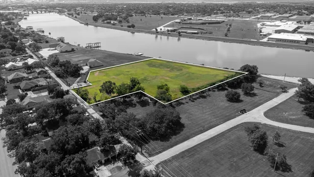 view of a pool with a yard