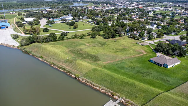 a view of a lake with a city