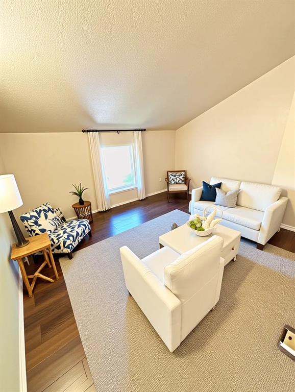 9696 Walnut Street, Unit 1305 Dallas, TX 75243 - Photo 13 of 25 a living room with furniture and a large window