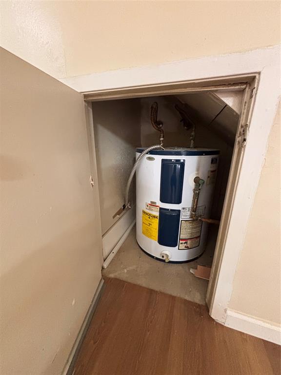 9696 Walnut Street, Unit 1305 Dallas, TX 75243 - Photo 22 of 25 a utility room with wooden floor