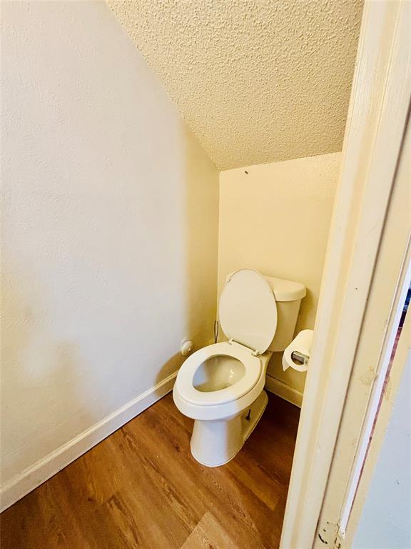 9696 Walnut Street, Unit 1305 Dallas, TX 75243 - Photo 24 of 25 a bathroom with a toilet and a sink
