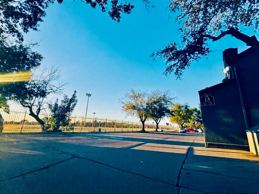 9696 Walnut Street, Unit 1305 Dallas, TX 75243 - Photo 3 of 25 a view of a swimming pool with an outdoor space and seating area