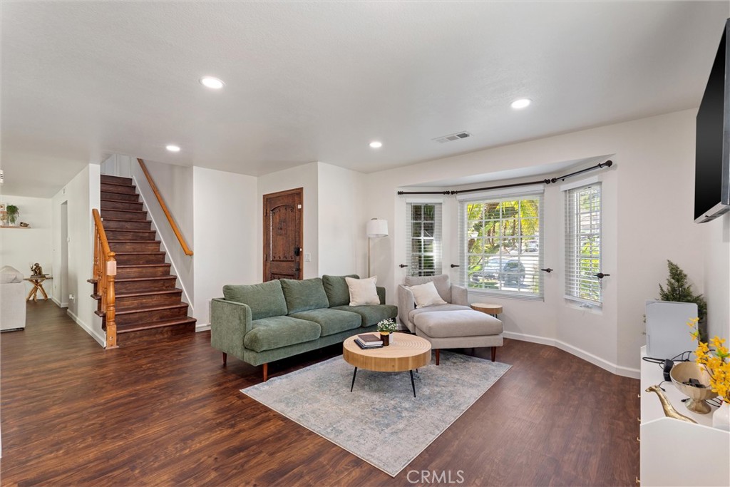31256 Quail Valley Road Castaic, CA 91384 - Photo 2 of 16 a living room with furniture and wooden floor