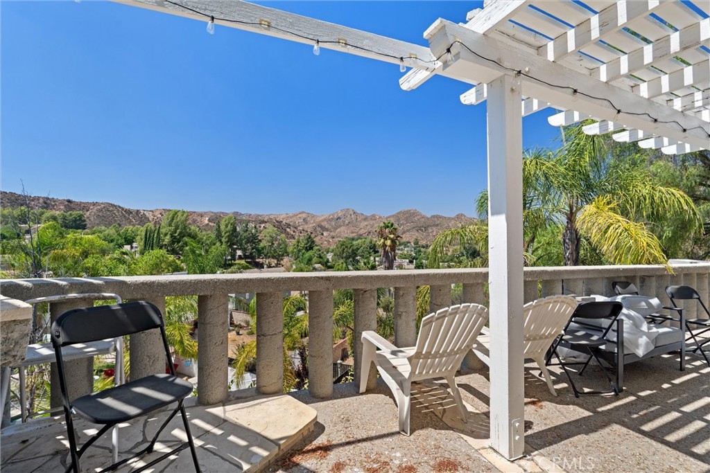 31256 Quail Valley Road Castaic, CA 91384 - Photo 3 of 16 a view of a balcony with furniture