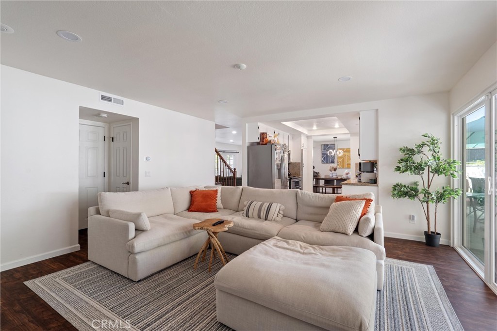 31256 Quail Valley Road Castaic, CA 91384 - Photo 8 of 16 a living room with furniture and a wooden floor