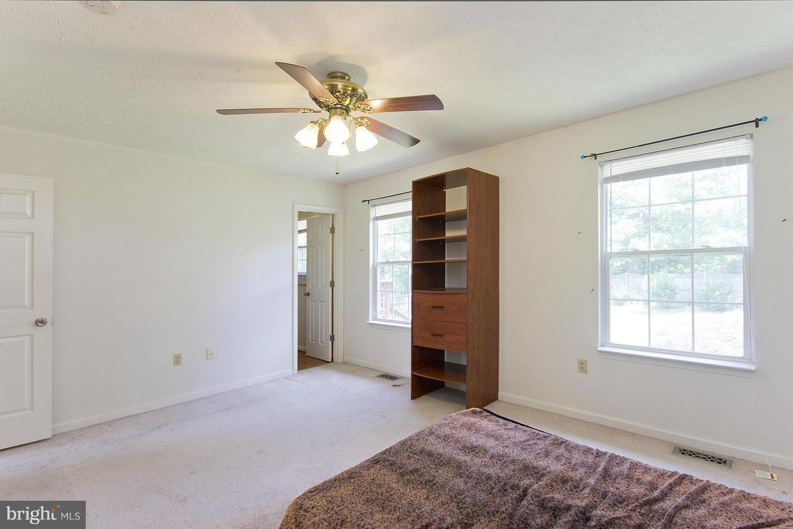 138 Charlton Road Winchester, VA 22602 - Photo 16 of 30 a view of an empty room with a window