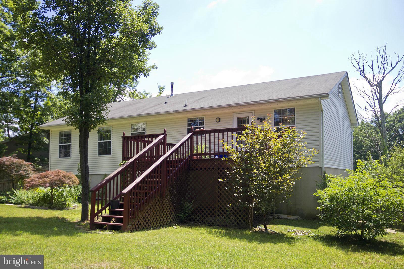138 Charlton Road Winchester, VA 22602 - Photo 29 of 30 a house view with a garden space
