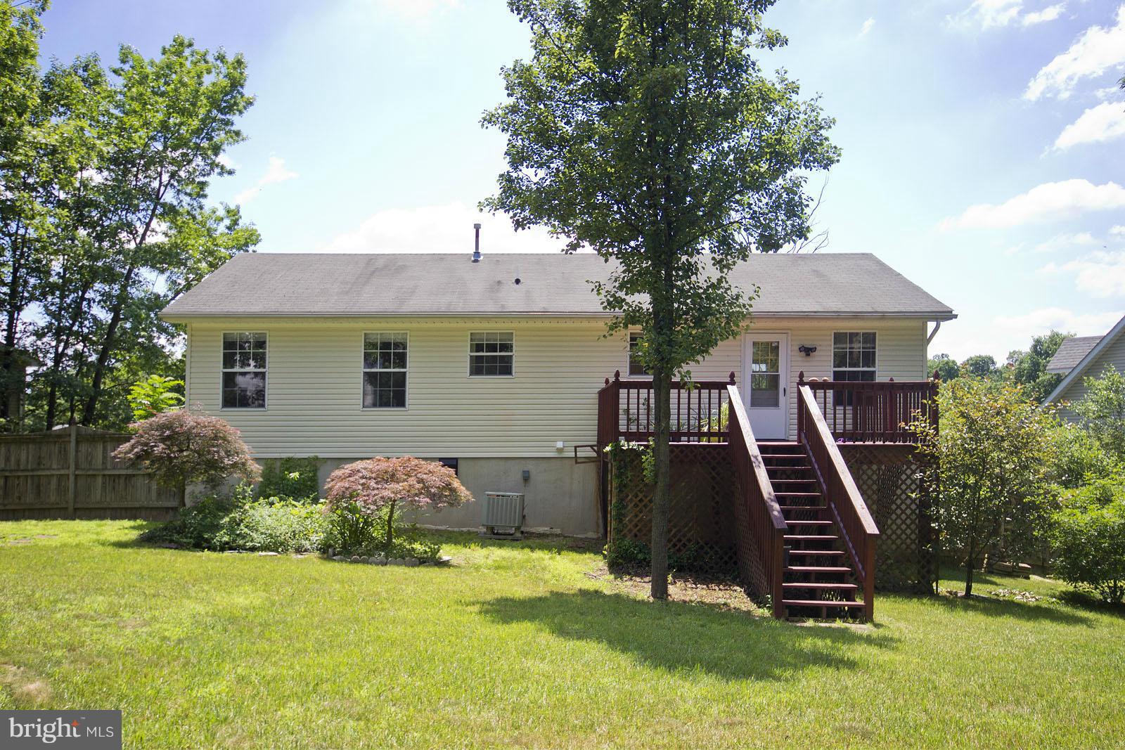 138 Charlton Road Winchester, VA 22602 - Photo 30 of 30 a front view of a house with garden