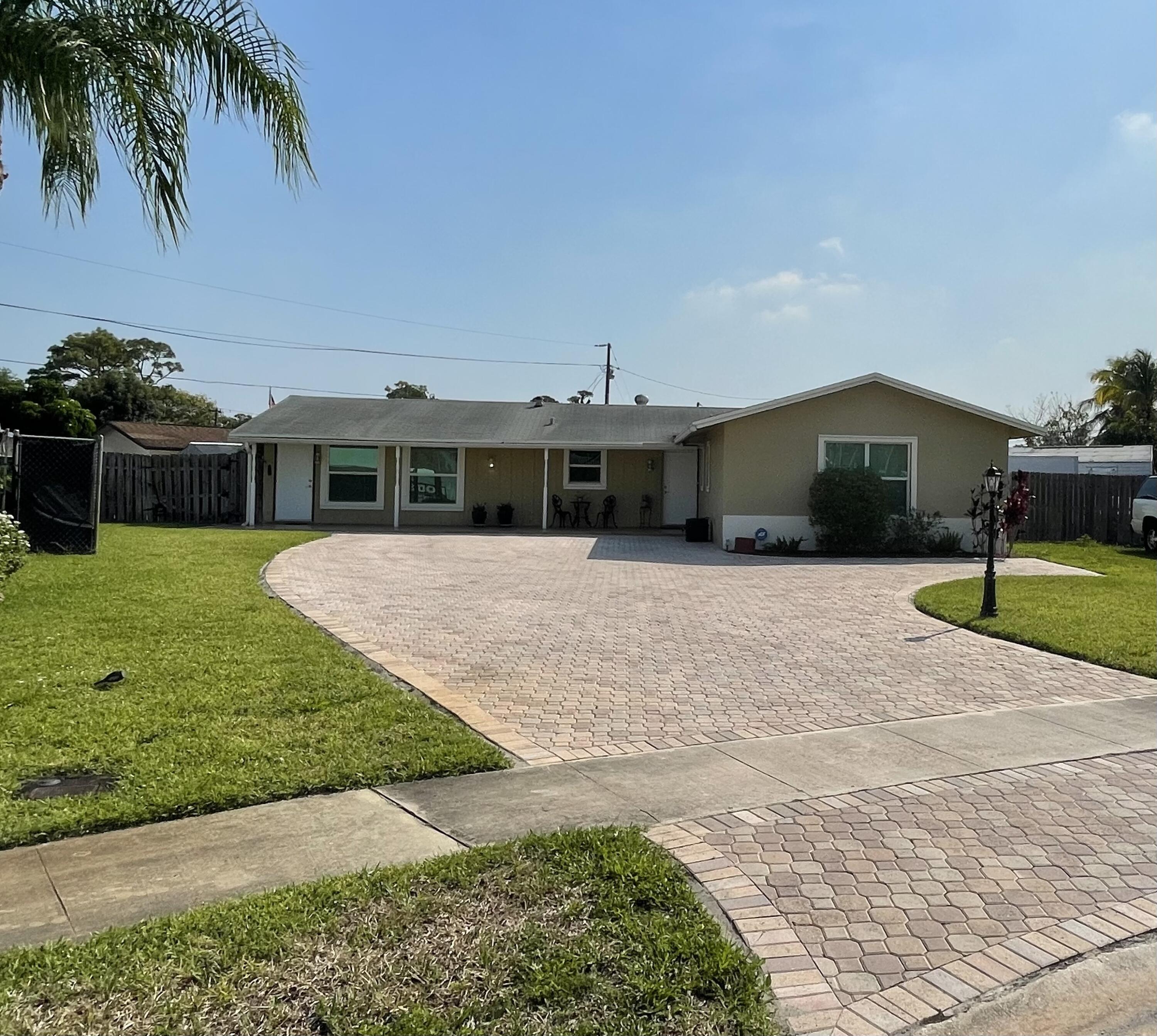 9641 Southwest 2nd Street Boca Raton, FL 33428 - Photo 1 of 23 FRONT