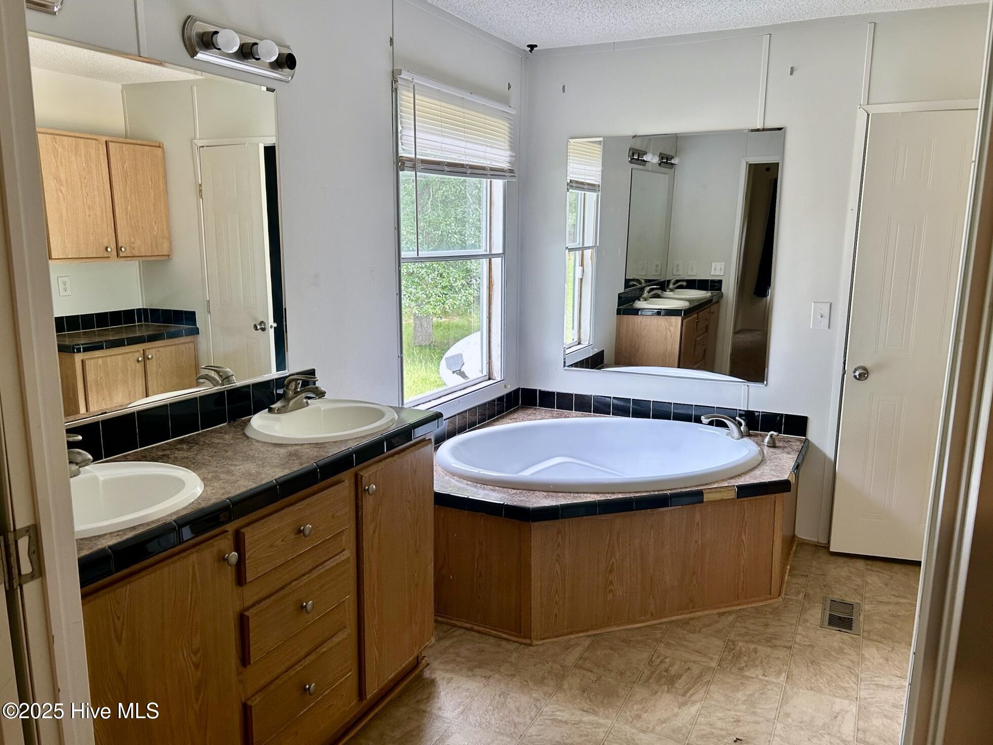 111 Willow Pond Road Hamlet, NC 28345 - Photo 23 of 49 master bathroom